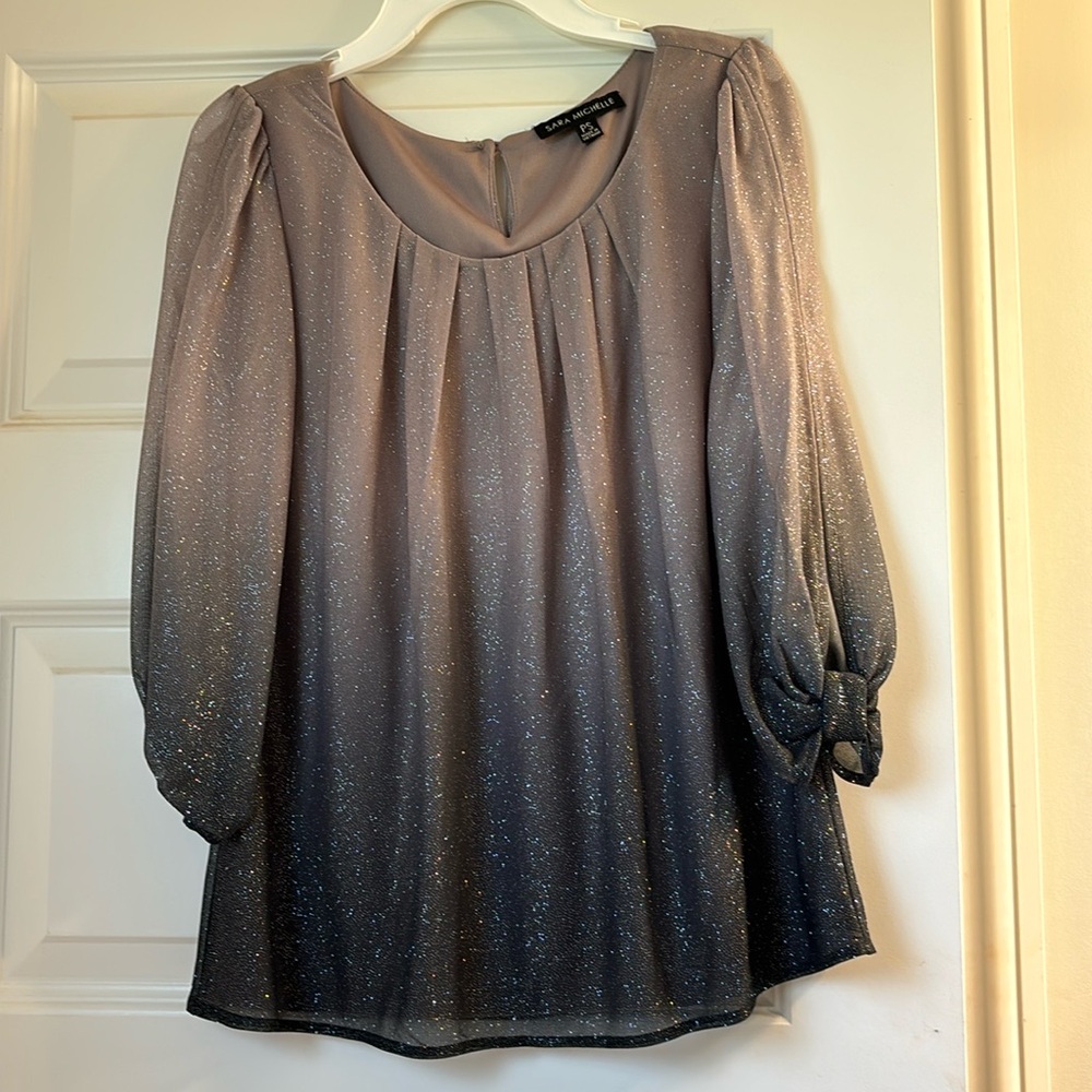 A cute Sara Michelle sparkly blouse. I’ve maybe worn it once.